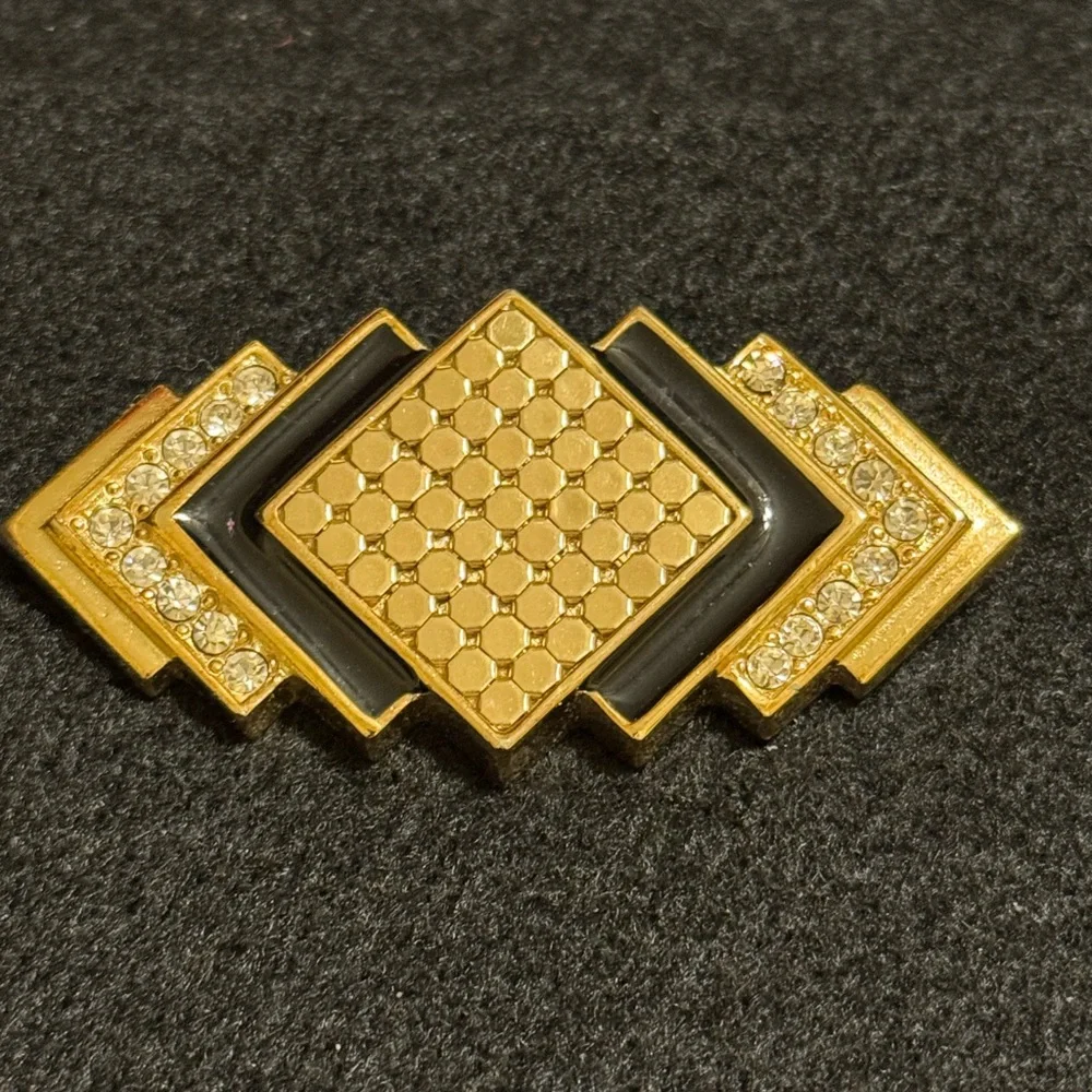 Vintage Whiting and Davis art deco style gold tone and rhinestone brooch